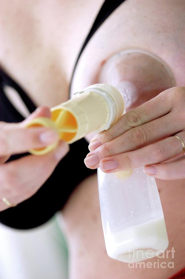 Premium Photo  Young woman expresses breast milk with a manual