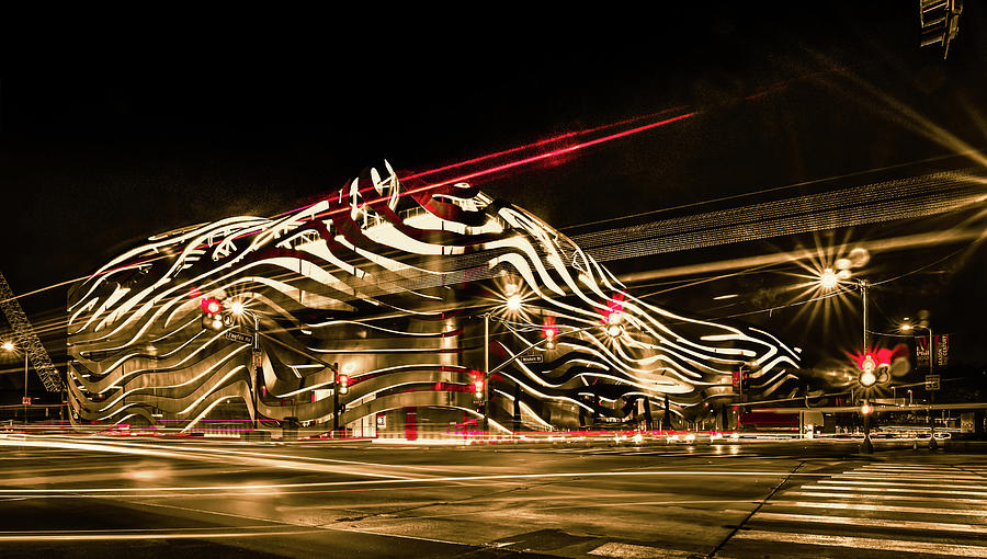 Exterior of Petersen Automotive Museum at night in november with Photograph by Alex Grichenko