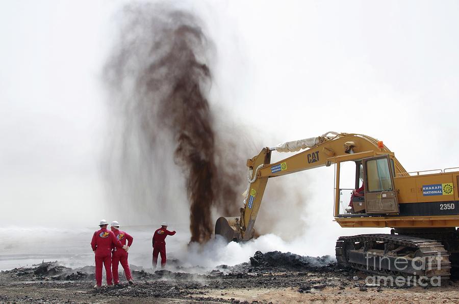 Iraq Photograph - Extinguished Oil Well Fire by Peter Menzel/science Photo Library