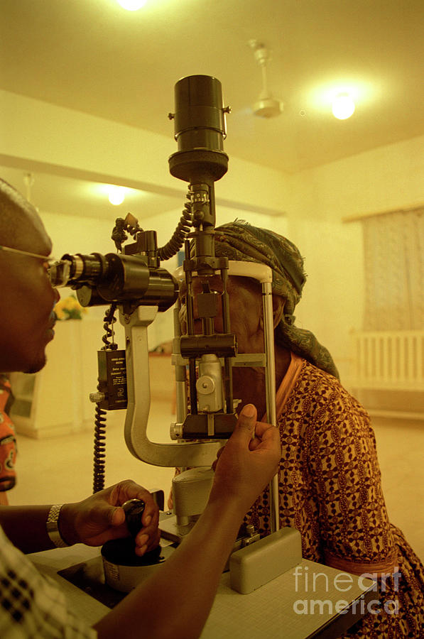 Eye Examination Photograph by Jason Kelvin/science Photo Library