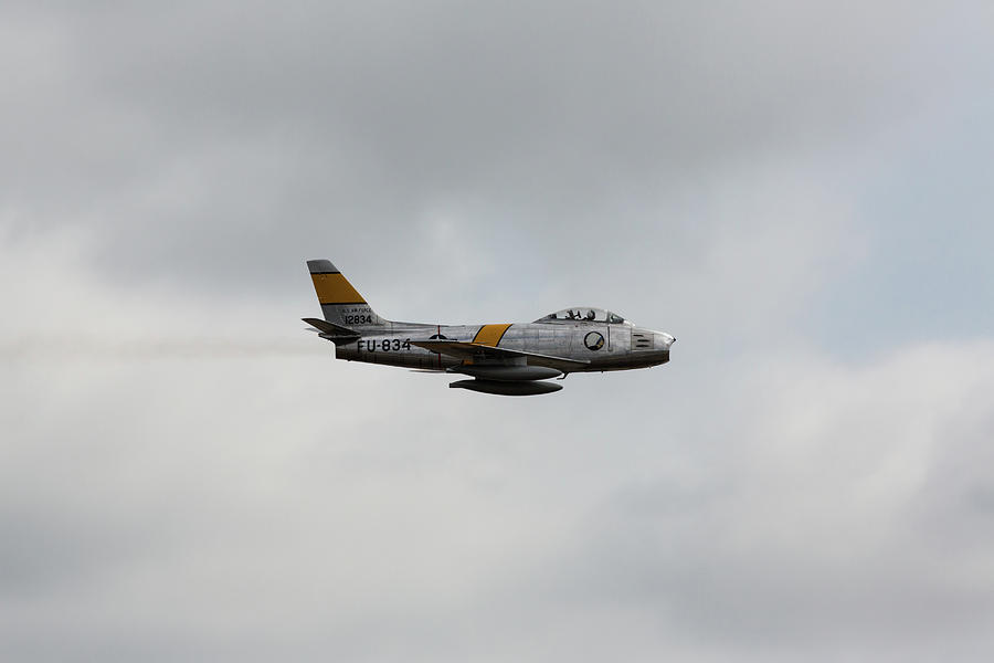 F-86 Sabre Gray Skies to Blue Photograph by John Daly