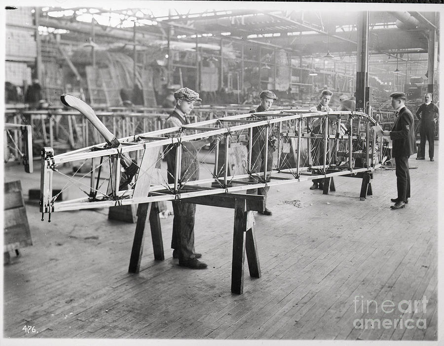Factory Workers Work On Aircraft Wing Photograph by Bettmann
