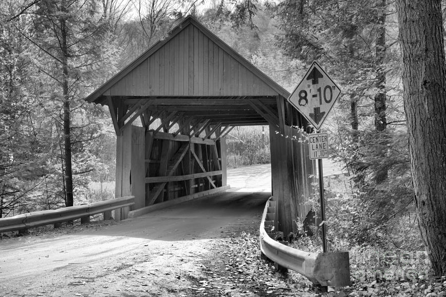 Fall Foliage Over The Red Covered Bridge Black And White Photograph by Adam Jewell
