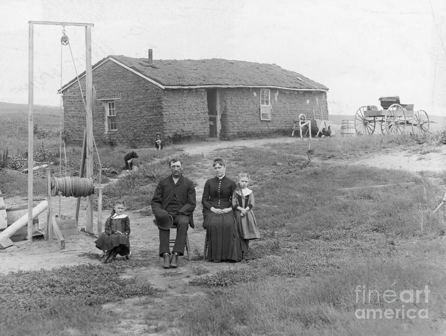 Family At Their Sod House In Nebraska Photograph by Bettmann