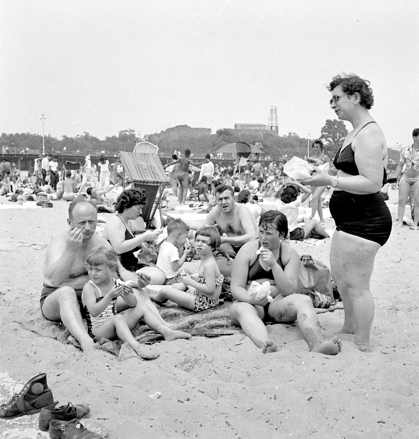Family Eating Sandwiches On The Beach Photograph by New York Daily News Archive