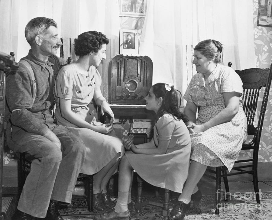 Family Gathered Around Radio Photograph by Bettmann