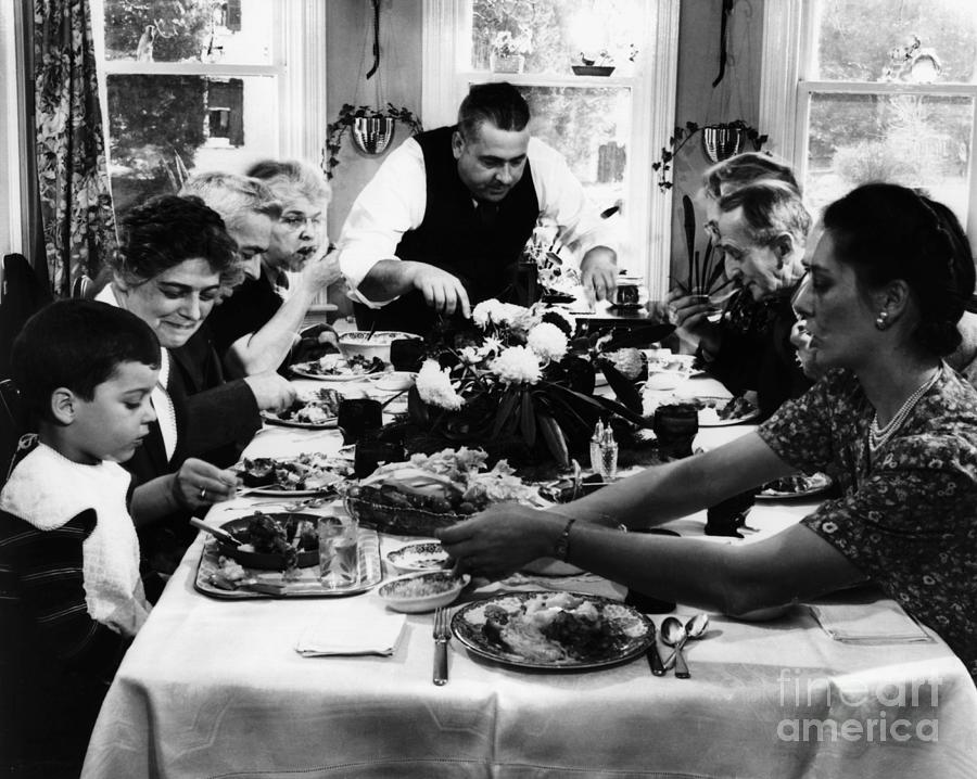 Family Having Thanksgiving Dinner Photograph by Bettmann