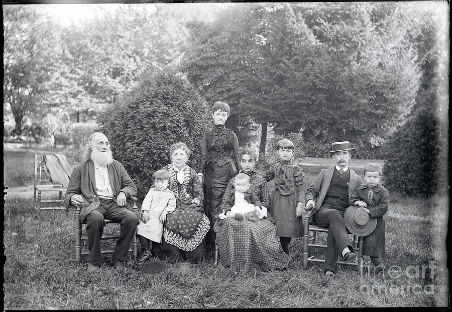 Family Posing On Lawn Photograph by Bettmann