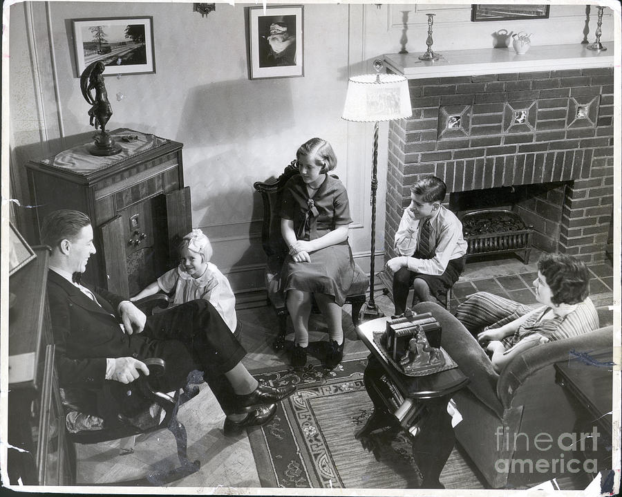 Family Seated In Living Room Photograph by Bettmann