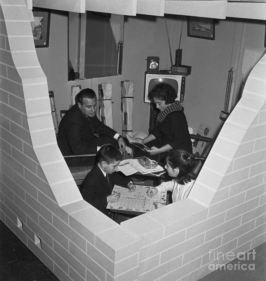 Family Sitting In Model Fallout Shelter Photograph by Bettmann