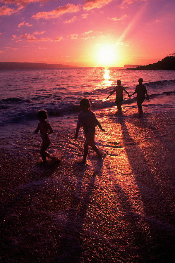 Family Walking On Beach At Dusk, Hi Photograph by Mark Gibson