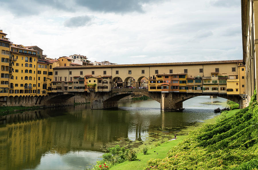 Famous Ponte Vecchio bridge in Florence, Italy Photograph by Tosca Weijers