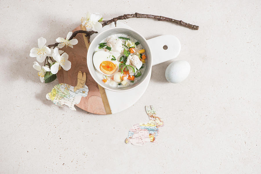 Fanesca easter Soup, Equador Decorated With A Sprig Of Blossom And Paper Bunnies Photograph by Fotografie-lucie-eisenmann