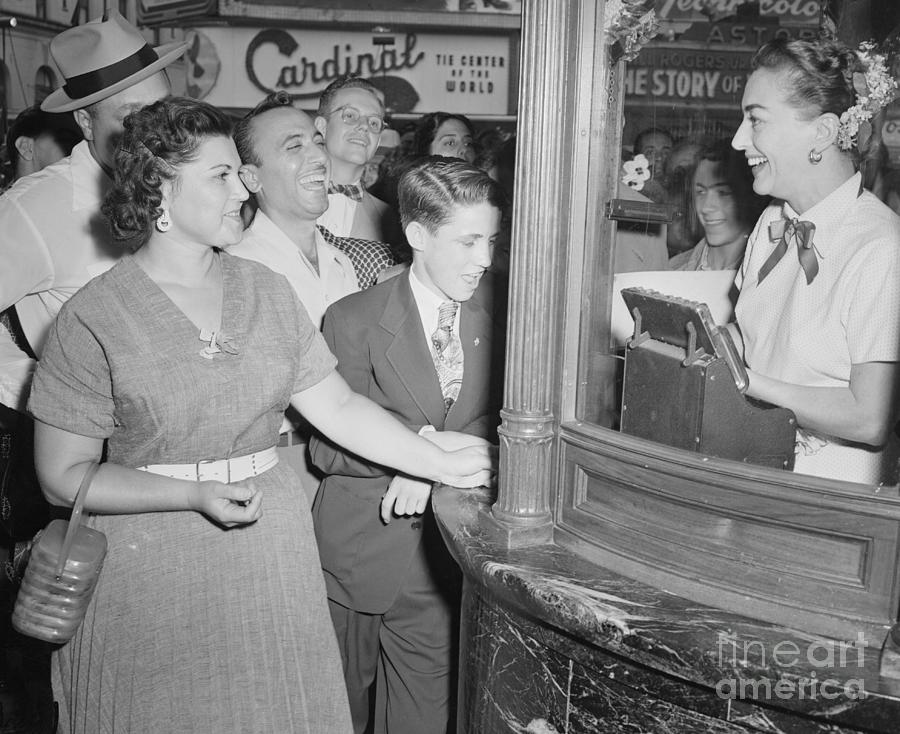 Fans Buying Tickets From Joan Crawford Photograph by Bettmann