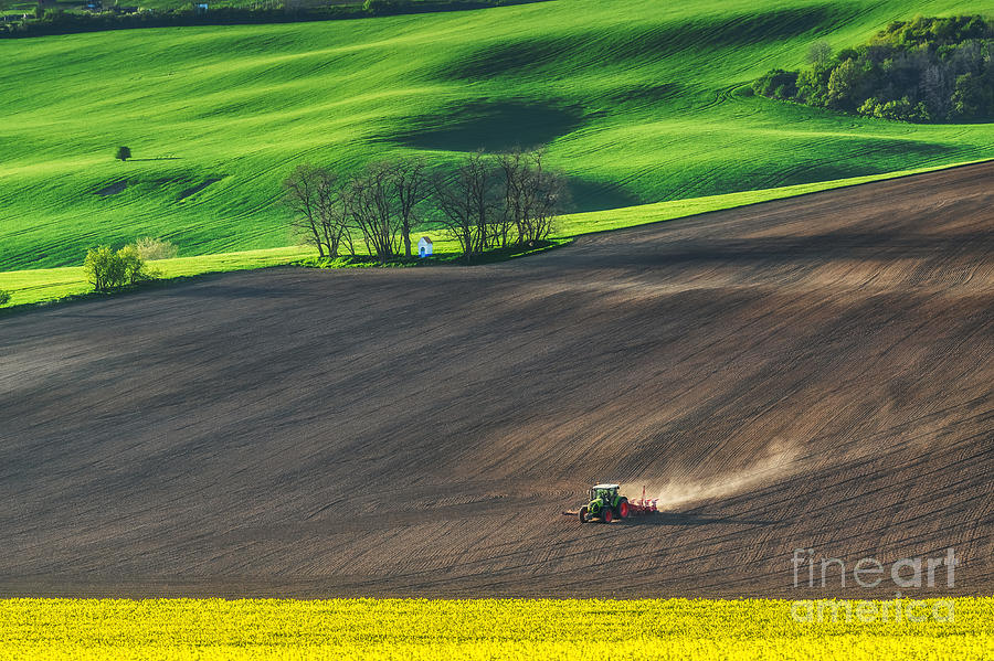 Rural Photograph - Farm Tractor Handles Earth On Field - by Dmytro Balkhovitin Rural Photograph - Farm Tractor Handles Earth On Field - by Dmytro Balkhovitin