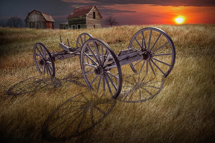 Farm Wagon Chassis in a Grassy Field on a Mid West Farm at Sunse Photograph by Randall Nyhof