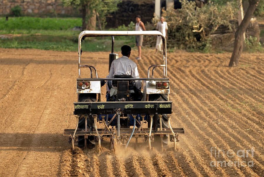 Farmer Ploughing A Field Photograph by Simon Fraser/science Photo ...