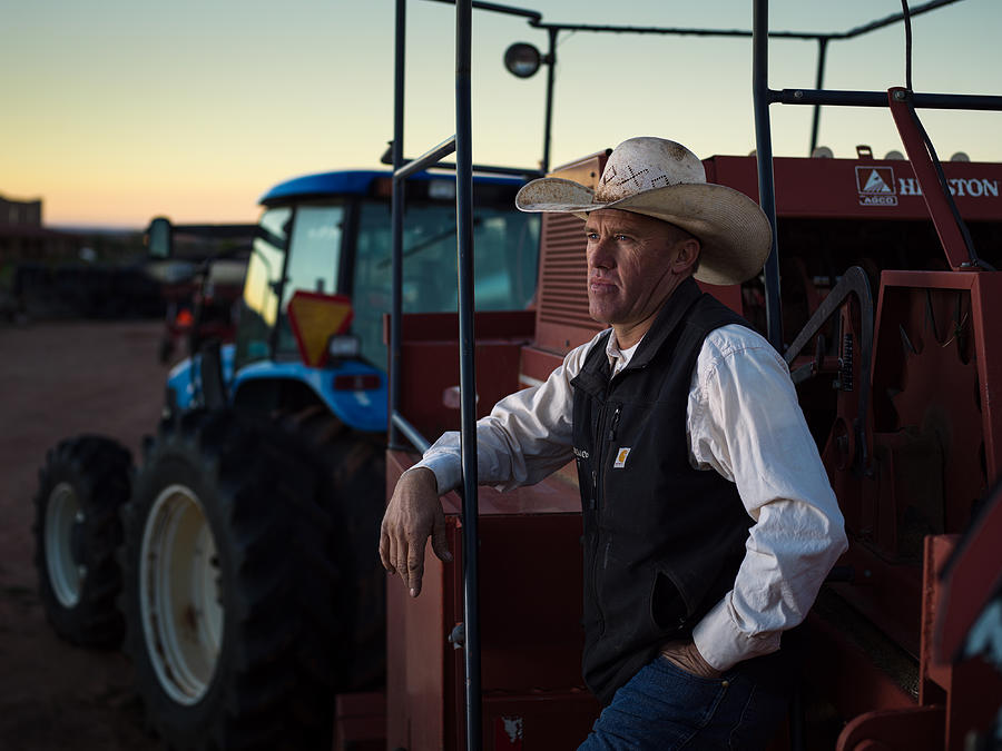Portrait Photograph - Farming A Cowboy by Matt Jacob