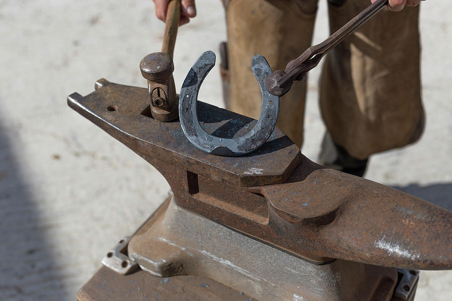 Tool Photograph - Farrier Shaping Hot Horseshoe On Anvil by Cavan Images