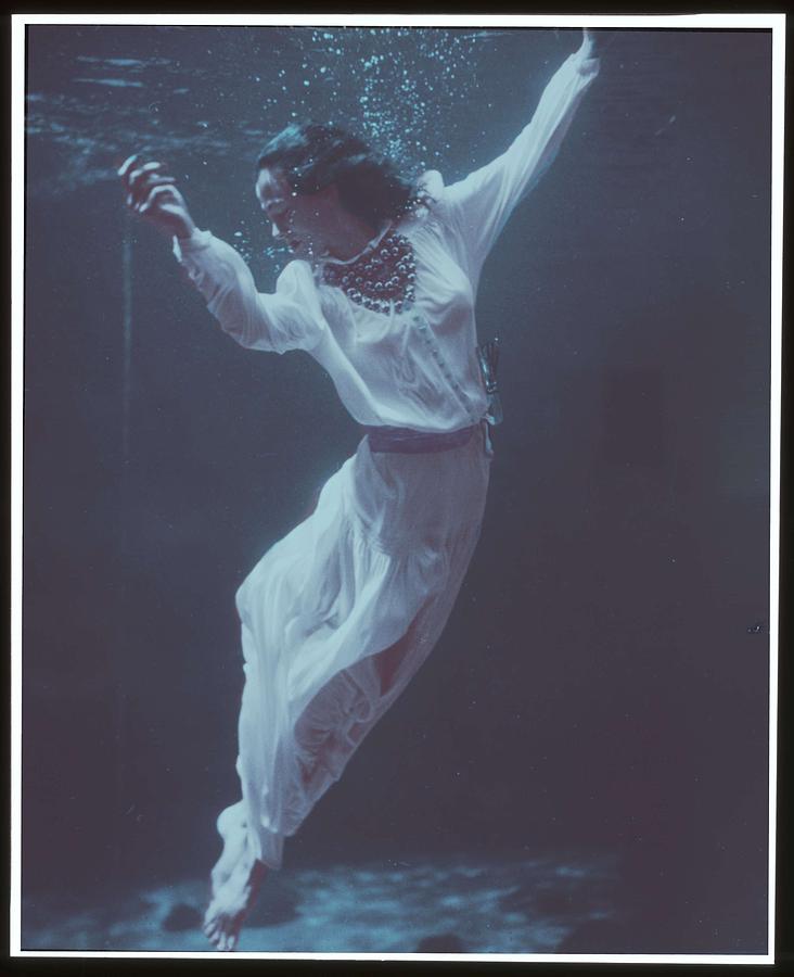  Fashion model underwater in dolphin tank Marineland  Florida   Frissell  Toni  1907 1988  photogr Painting by Celestial Images
