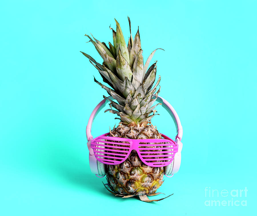 Fashionable  trendy pineapple fruit with headphones and sun glas Photograph by Jelena Jovanovic