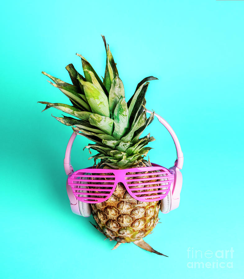 Fashionable trendy pineapple fruit with headphones and sun glass Photograph by Jelena Jovanovic