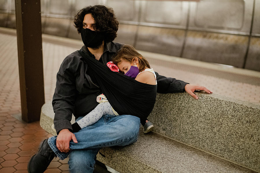 Father And Daughter On Metro Waiting For Train Photograph by Cavan