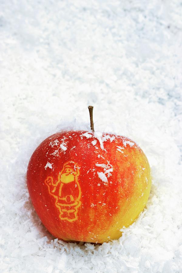 Father Christmas Carved Into An Apple Photograph by Petr Gross