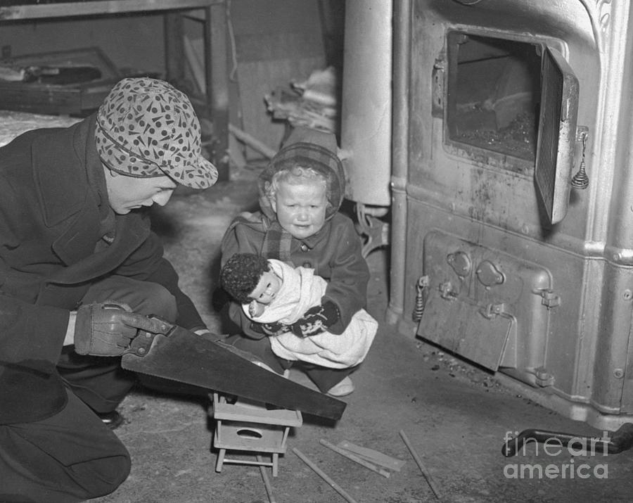 Father Uses Toy High Chair For Fuel Photograph by Bettmann