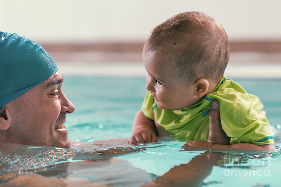 Father With Baby Boy In The Swimming Pool Photograph by Microgen Images/science Photo Library
