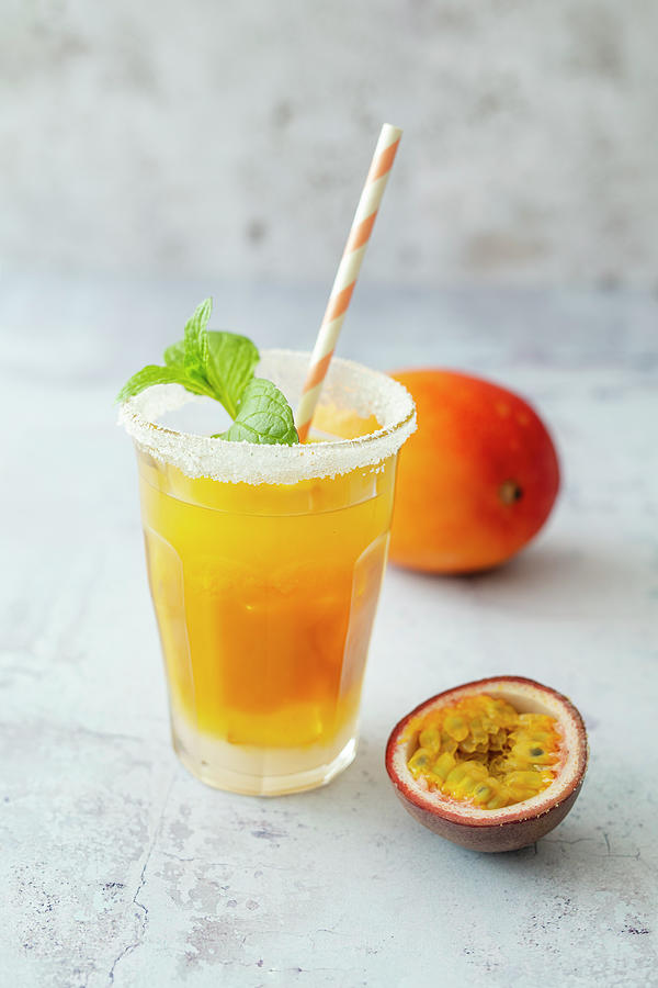 Feels Like Asia mocktail With Passion Fruit Juice, Mango Puree And Tabasco Photograph by Jan Wischnewski