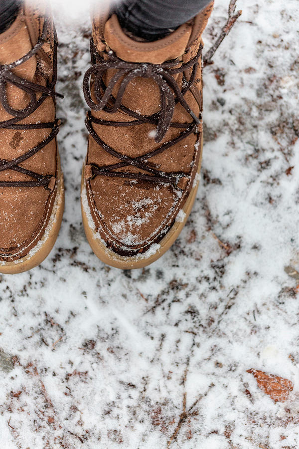 Feet Wearing Winter Shoes In Snow Photograph by Syl Loves
