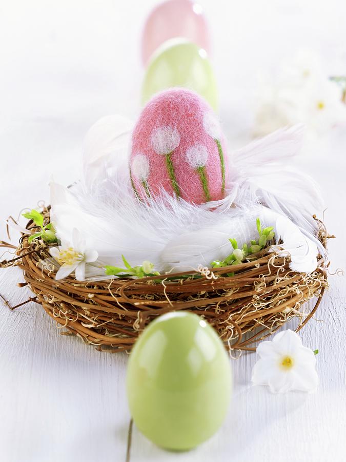 Felt Easter Egg In Easter Nest Of Feathers & Twigs Photograph by Stephanie Gayer