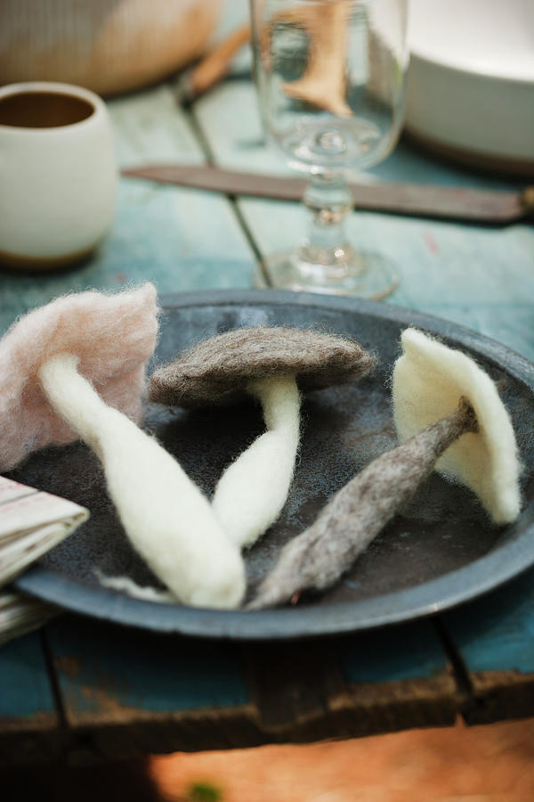 Felted Mushrooms On Plate On Table Photograph by Colin Cooke