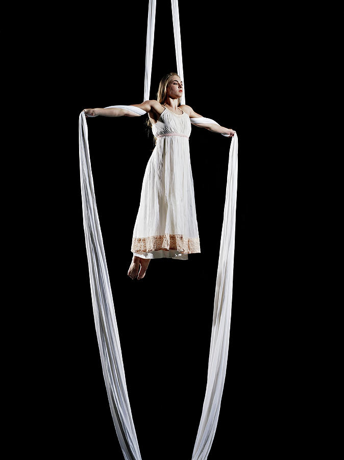 Female Aerialist Performing On Photograph by Thomas Barwick