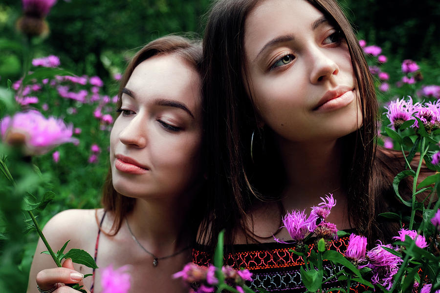 Flower Photograph - Female Friends Amidst Flowering Plants At Field by Cavan Images