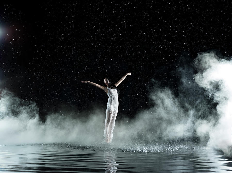 Female In White Dancing, Rainy Night Photograph by Jonathan Knowles