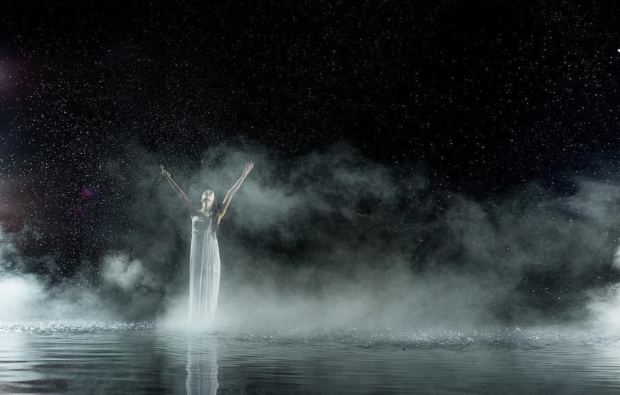 Female In White In Water, Rainy Night Photograph by Jonathan Knowles