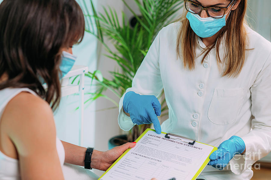 Female Patient Filling In Vaccine Information Statement Photograph by Science Photo Library Female Patient Filling In Vaccine Information Statement Photograph by Science Photo Library