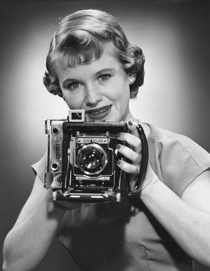 Female Photographer Photograph by George Marks