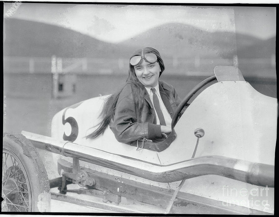 Female Race Driver Posing In Her Car Photograph by Bettmann