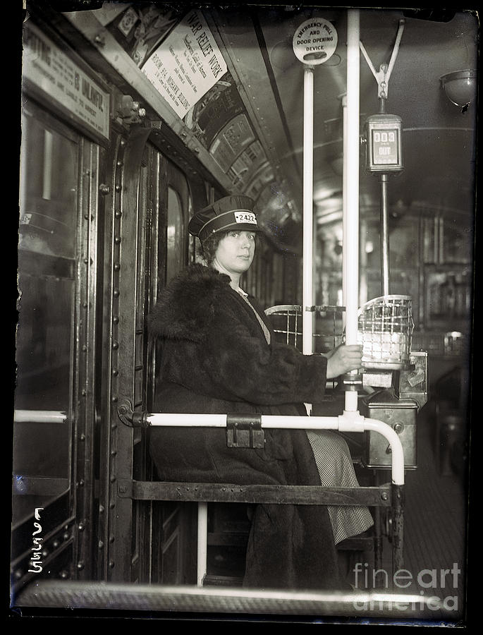 Female Streetcar Conductor Seated Photograph by Bettmann