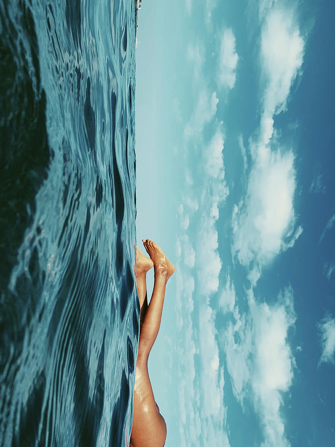 Female Surfer Legs On Water Against Blue Sky Photograph by Cavan Images Female Surfer Legs On Water Against Blue Sky Photograph by Cavan Images