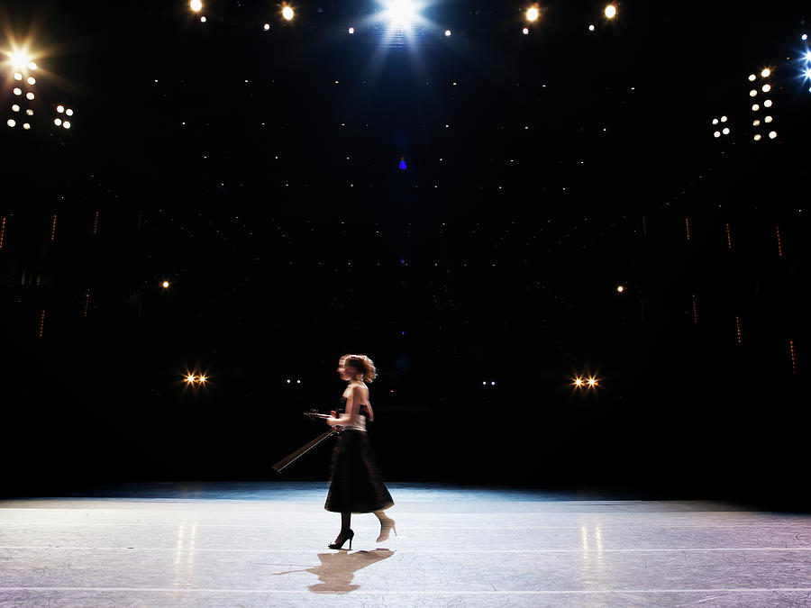 Female Violinist Walking Off Stage Photograph by Thomas Barwick