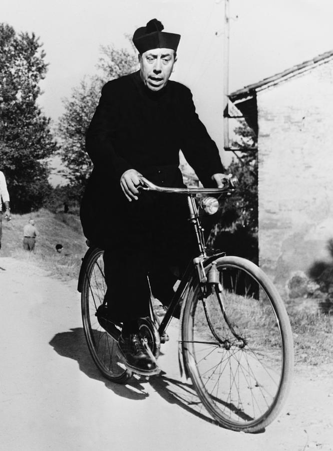 Fernandel Going By Cycle In A Don Photograph by Keystone-france