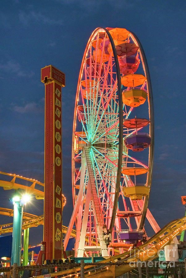 Ferris Wheel over the Ocean Photograph by David Zanzinger