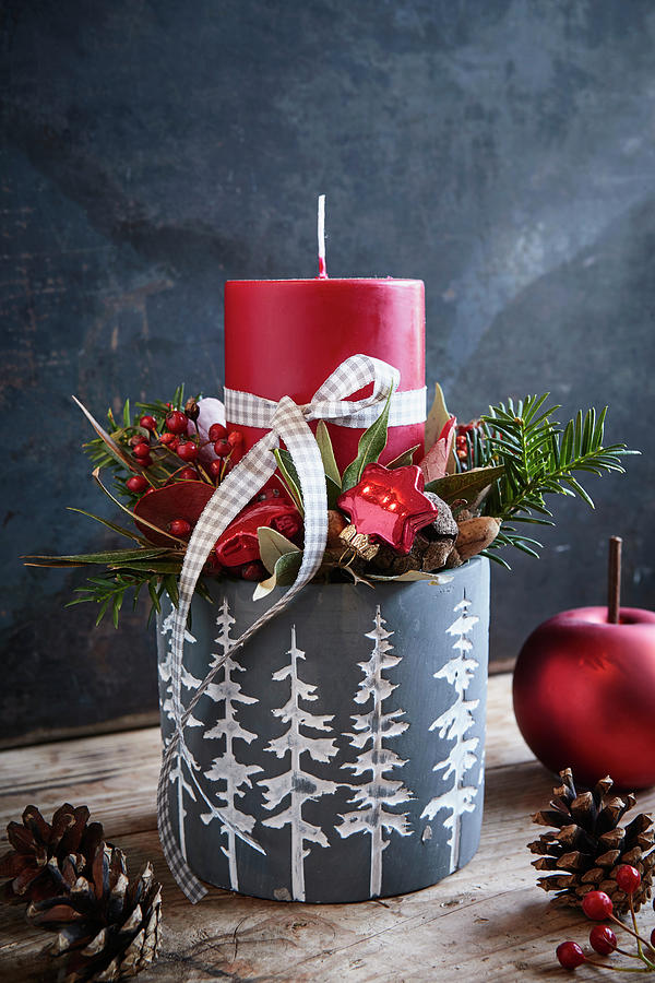 Festive Arrangement With Red Candle In Grey Flower Pot Photograph by Brigitte Sporrer
