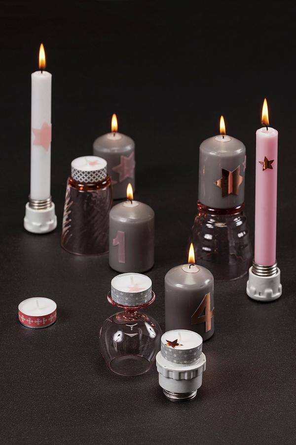 Festive Candlesticks Made From Upturned Drinking Glasses And Light Bulb Sockets Photograph by Studio27neun