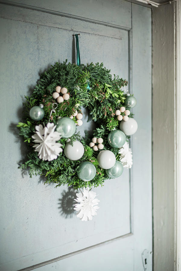 Festive Door Wreath With Paper Snowflakes And Baubles Photograph by Pia Simon
