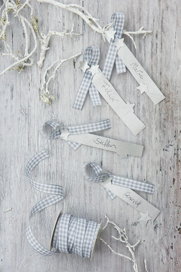 Festive Name Tags Handmade From Strips Of Paper And Gingham Ribbon Photograph by Martina Schindler